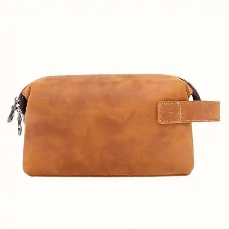 Premium leather accessory organizer in a refined hotel setting, bridging traditional craft and modern utility